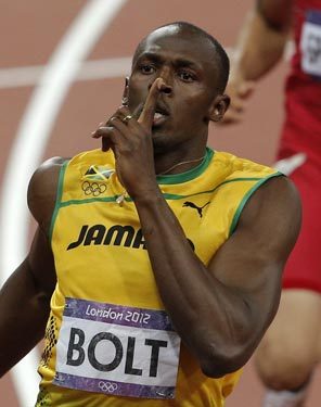 Jamaica's Usain Bolt reacts as he wins the men's 200-meter final to become the first man with two Olympic titles at that distance. The Associated Press