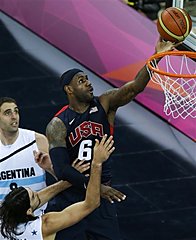 United States' LeBron James (6) shoots for the basket past Argentina's Juan Gutierrez