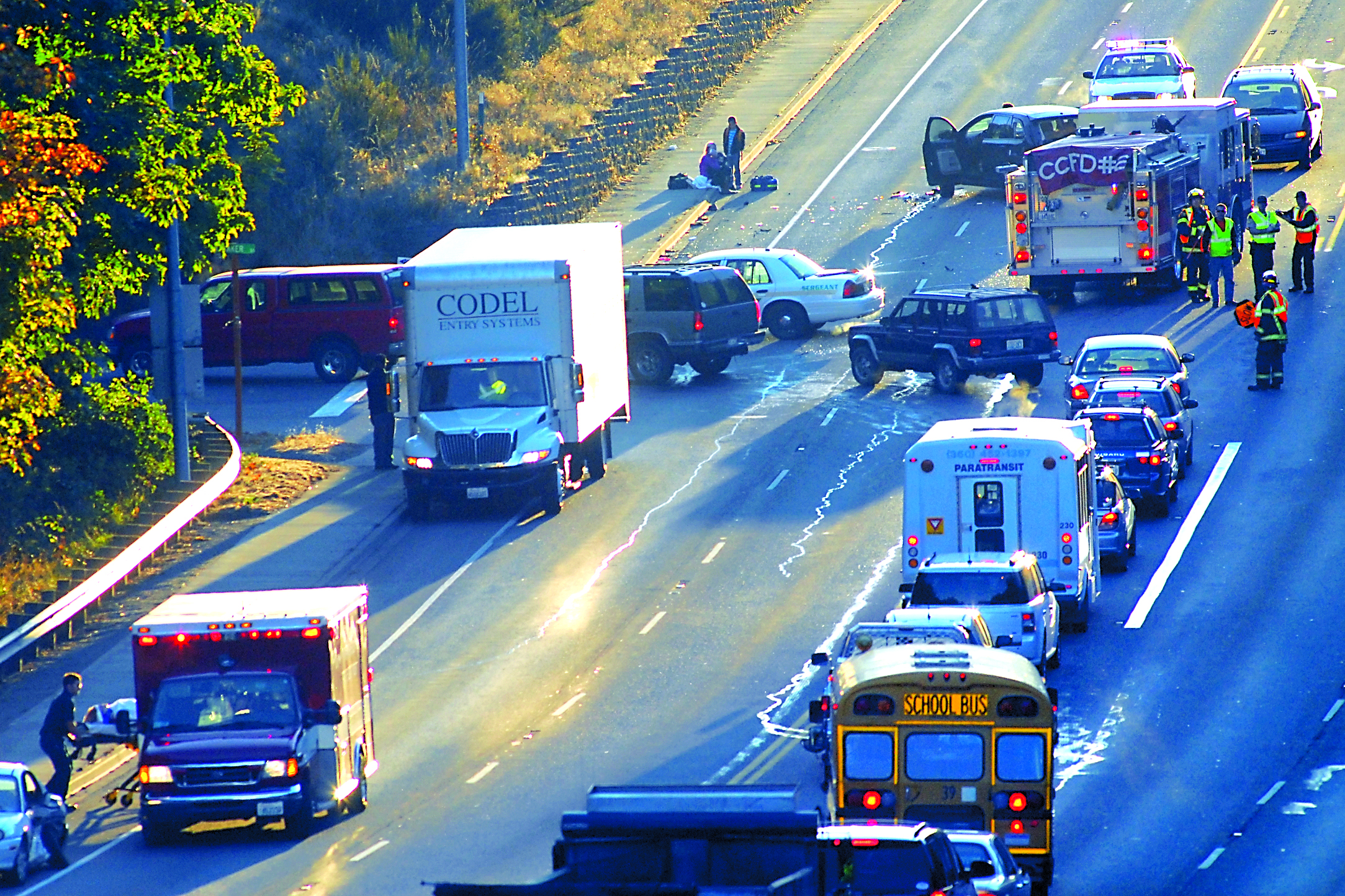 Traffic is detoured around the scene of a multi-vehicle wreck on U.S. Highway 101 at Baker Street this morning on the east side of Port Angeles. Keith Thorpe/Peninsula Daily News