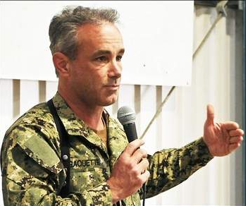 Rear Adm. Charles Gaouette addresses sailors on Nov. 7