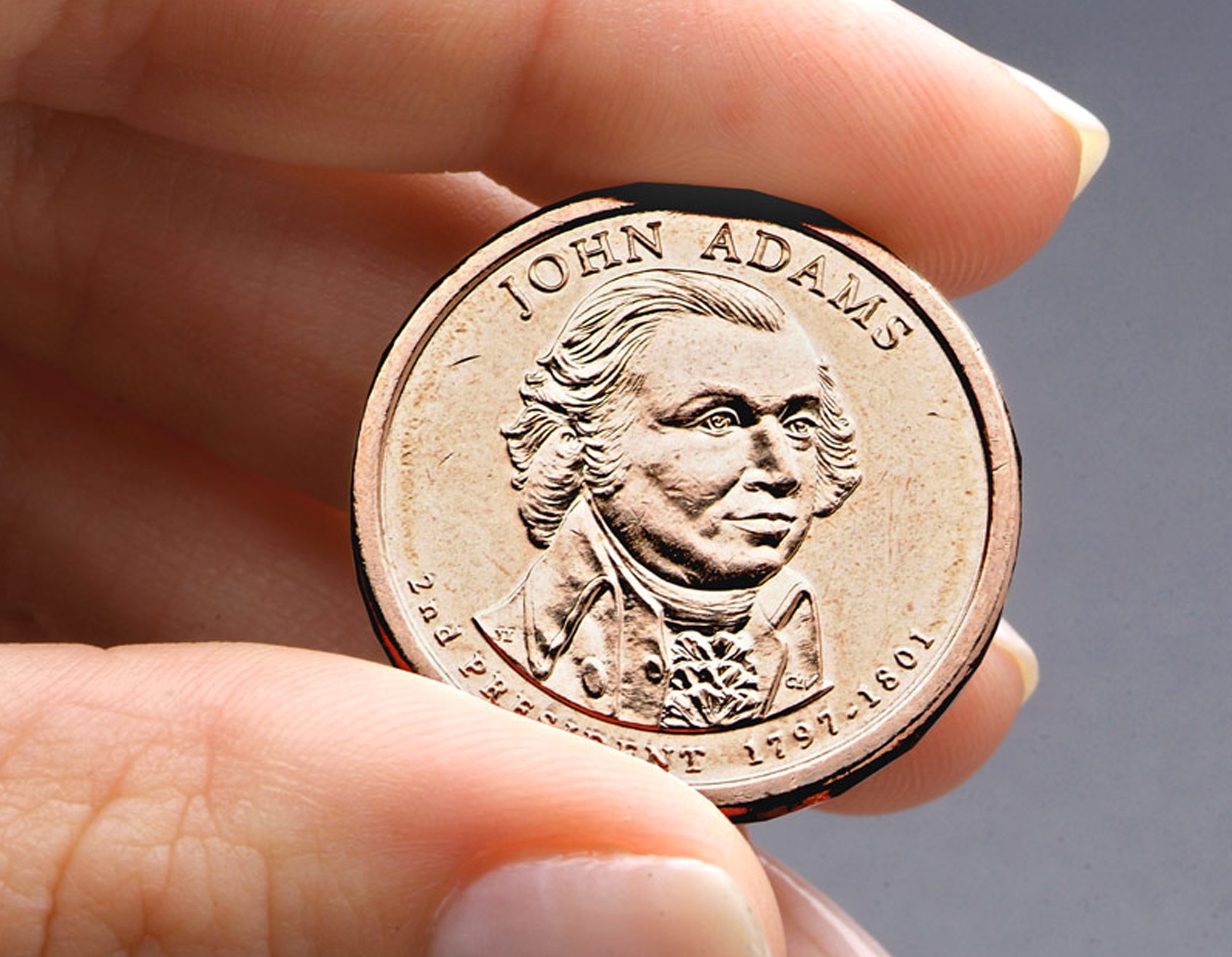 President John Adams presidential $1 coin. The Associated Press