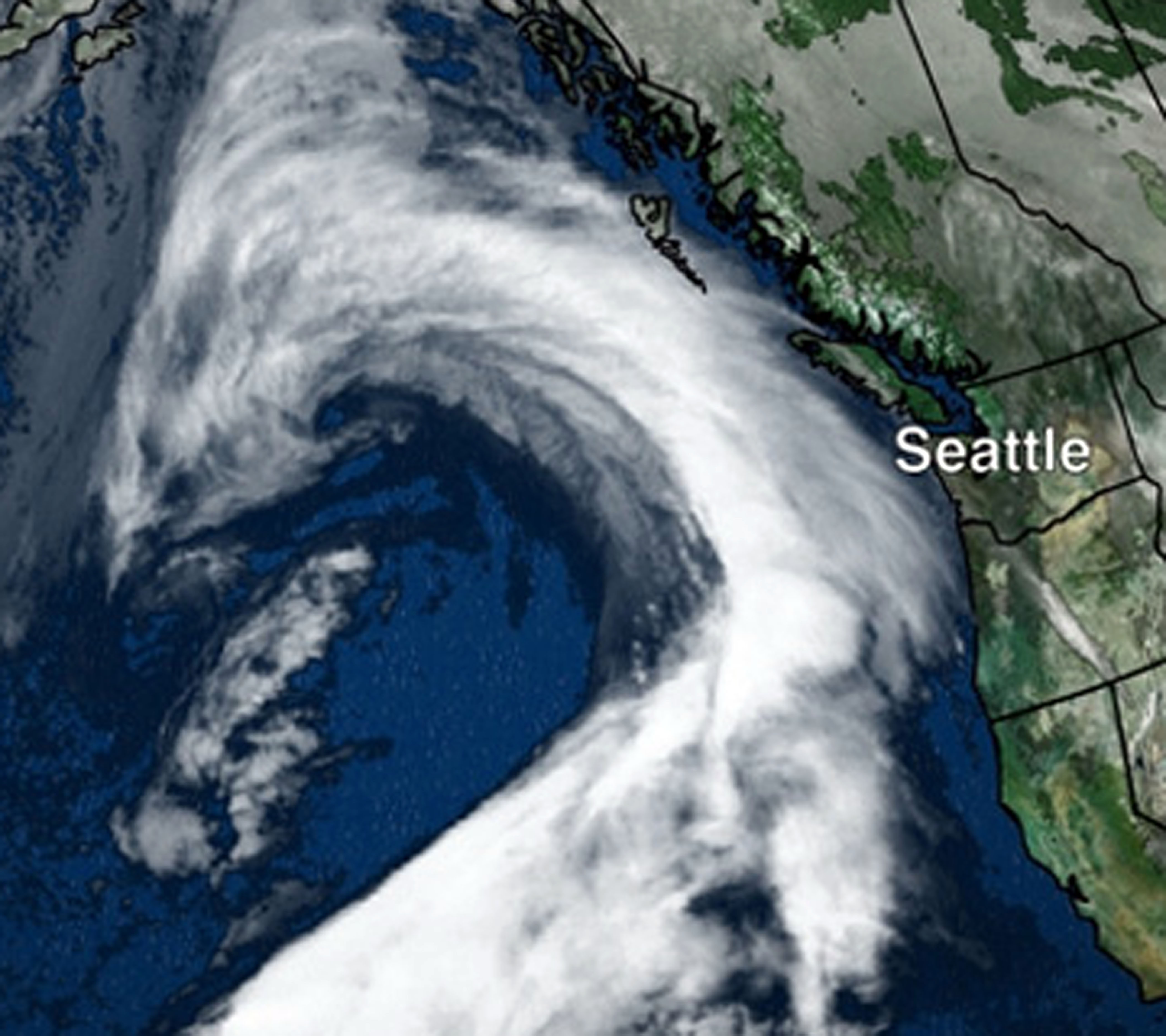 Satellite view shows the Christmas Day storm bearing down on the Washington-Oregon-British Columbia coastlines. National Weather Service
