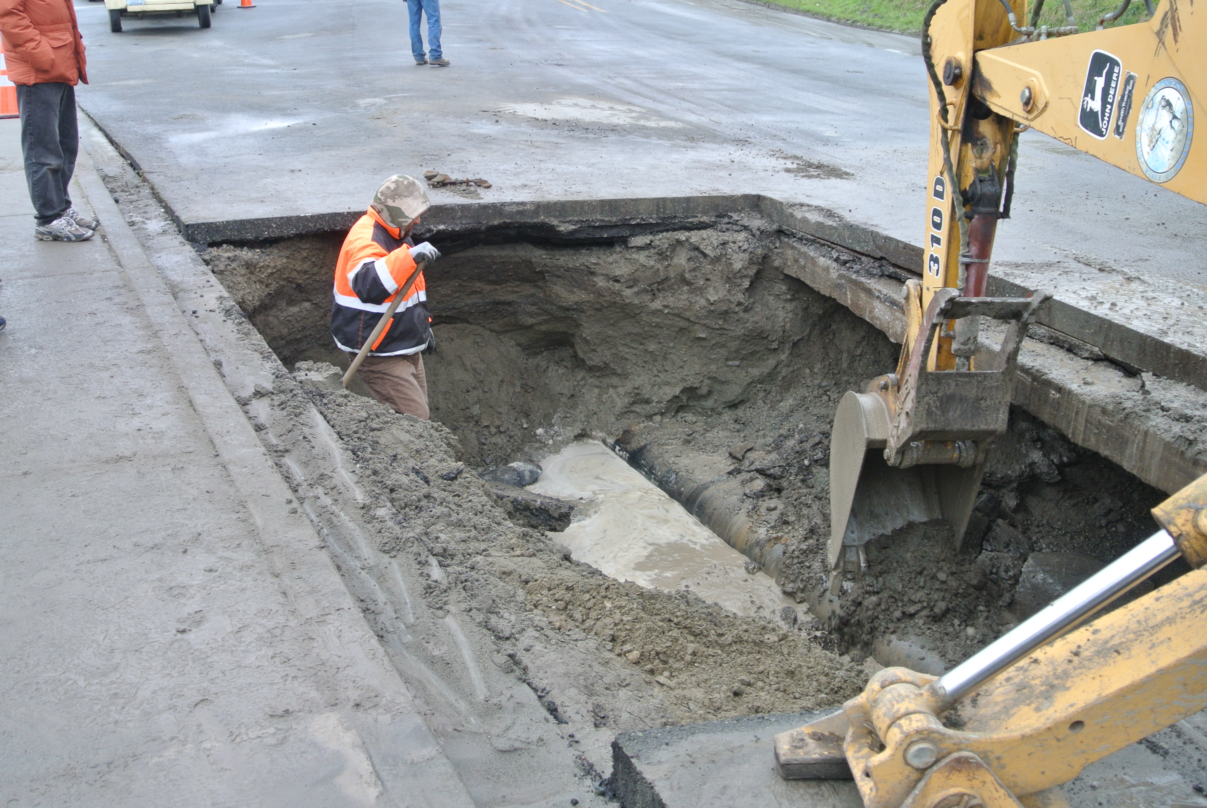 City crews work on a water main break on Water Street in front of the Tides Inn on Sunday morning. After the pipe is repaired