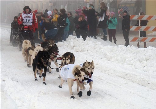 Defending champion Dallas Seavey takes off during Saturday's ceremonial start of the 2013 Iditarod Trail Sled Dog Race. The Associated Press