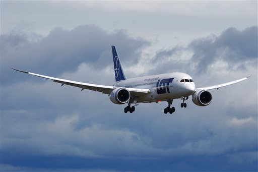 A 787 Dreamliner flies over Paine Field in Everett last week during a test of its electrical system. The airliner bears the name LOT Polish Airways