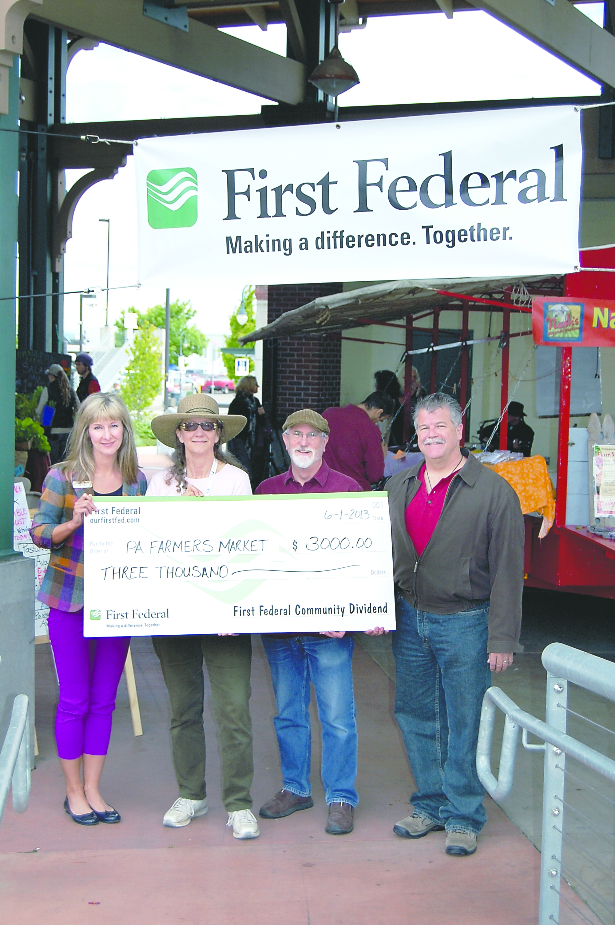 Port Angeles Farmers Market Manager Cynthia Warne and Board President Hank Gibson