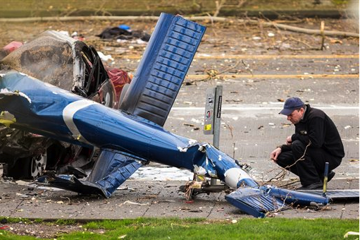 One of several photos from the helicopter crash scene. The Associated Press