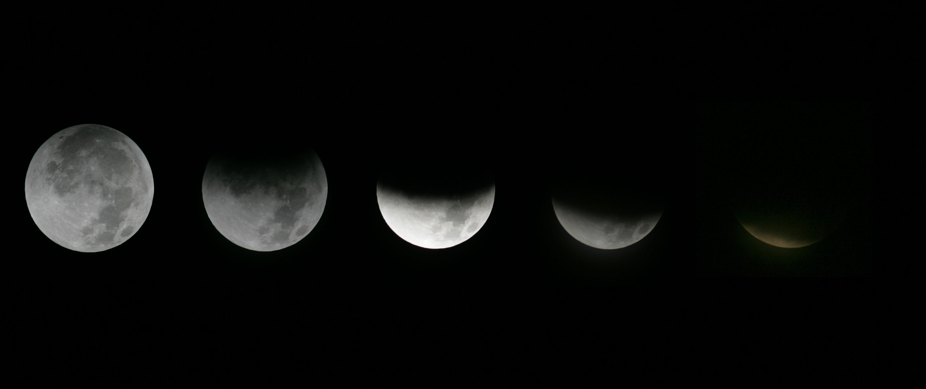 This combination of photos shows the different stages of the moon during a lunar eclipse as seen from the Griffith Observatory in Los Angeles on Dec. 10