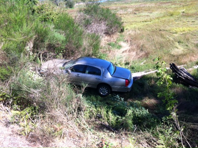 Three people suffered minor injuries when a car left the roadway and rolled on U.S. Highway 101 on Thursday afternoon