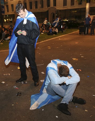 Supporters of the Yes campaign for the Scottish independence referendum in Glasgow early today