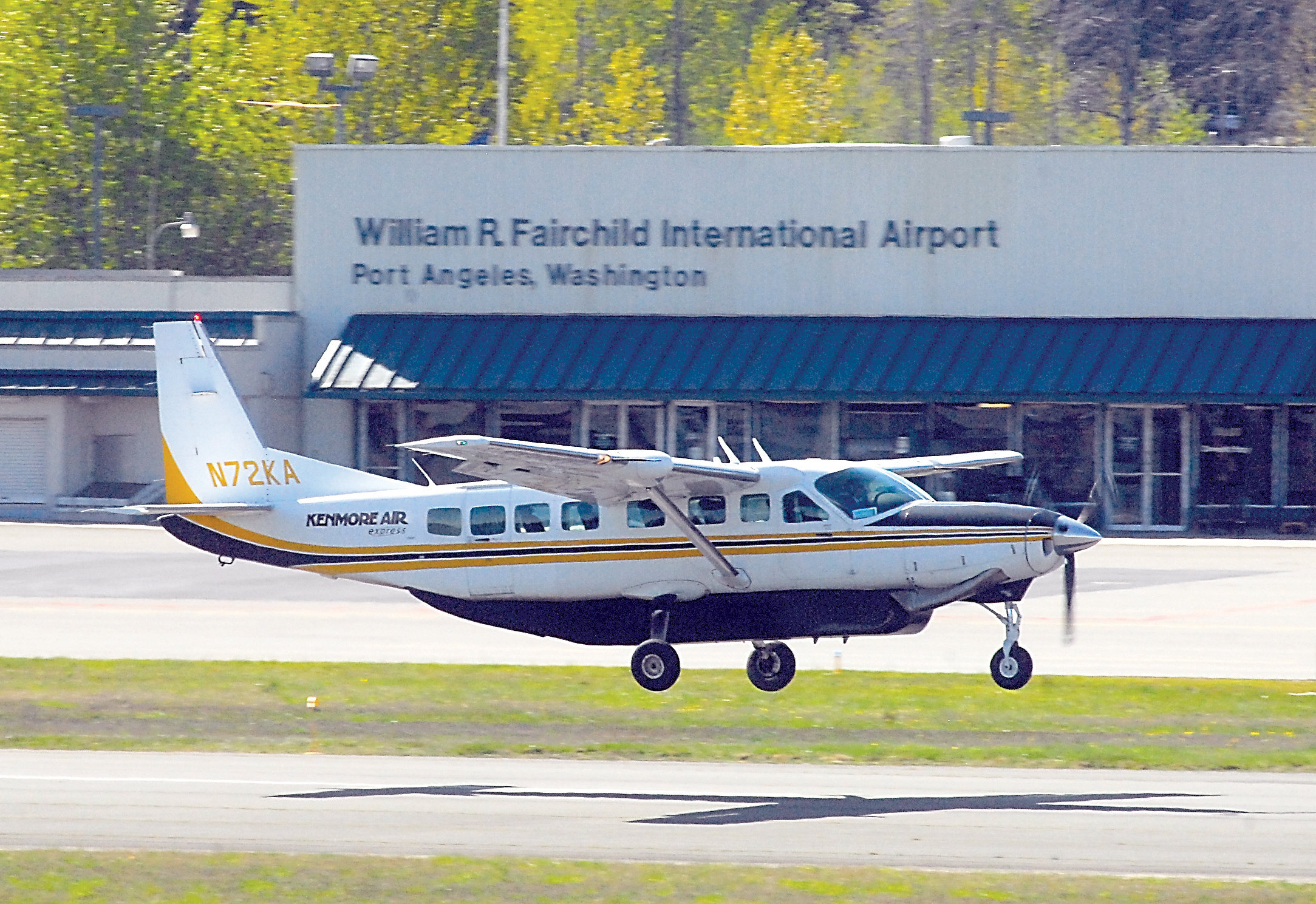 A Kenmore Air Express commuter plane lands at William R. Fairchild International Airport in Port Angeles last March. Keith Thorpe/Peninsula Daily News