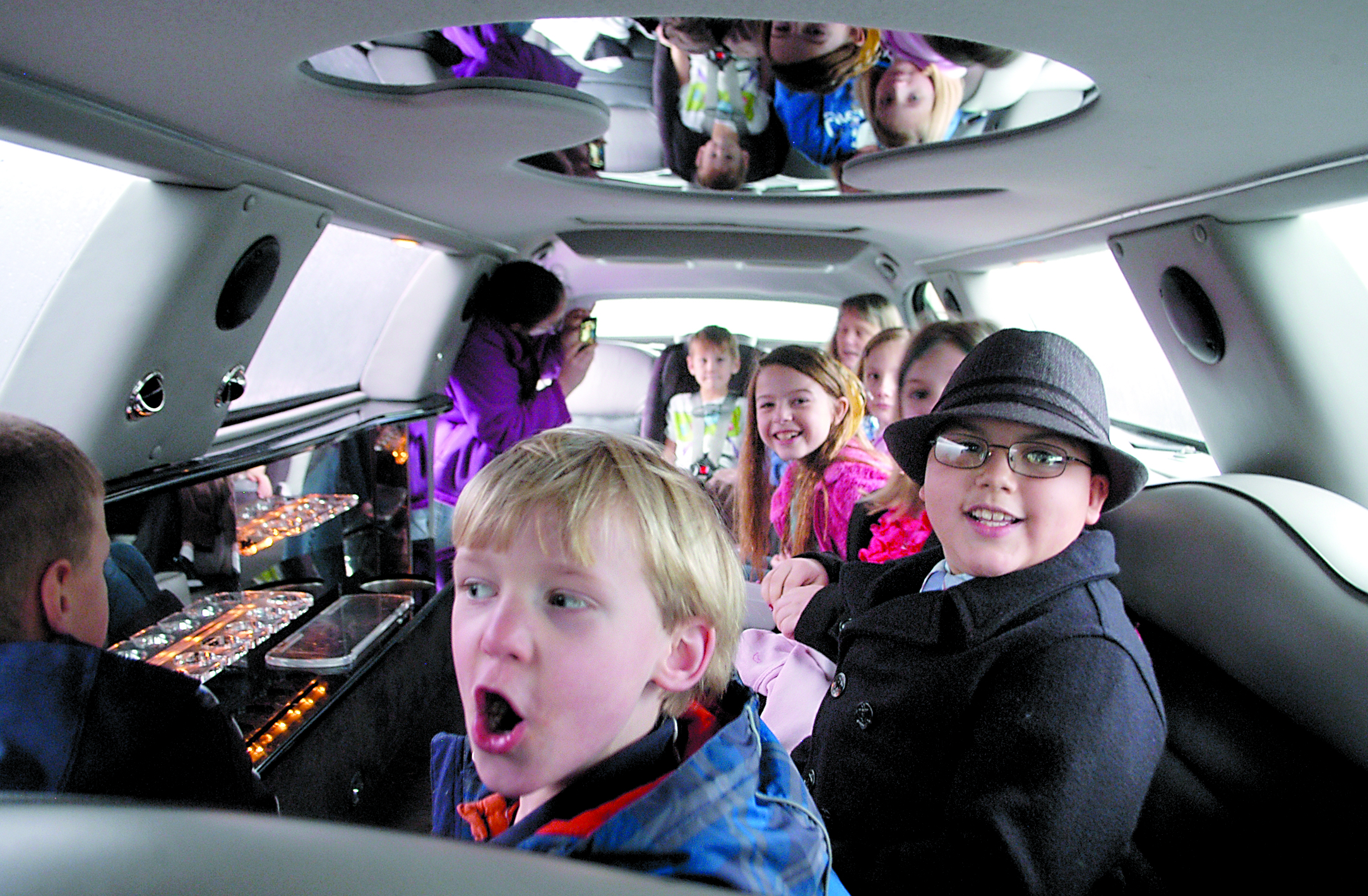 Greywolf Elementarary School students are treated Wednesday to a limo ride and special lunch with Principal Donna Hudson for raising funds in the PTA's annual jog-a-thon fundraiser. The top fundraisers were