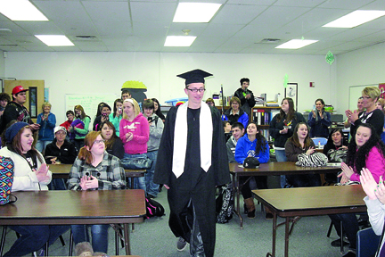 Lincoln High School students and staff gather to celebrate Chris Clay's midyear graduation. Port Angeles School District