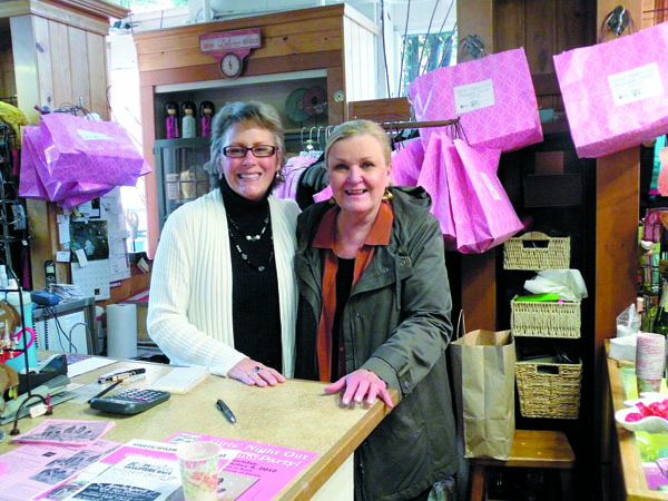 Main Street supported a recent Girls Night Out event in Port Townsend. Shown are Christy Taylor and Gail Boulter at the Clothes Horse. Charlie Bermant/Peninsula Daily News