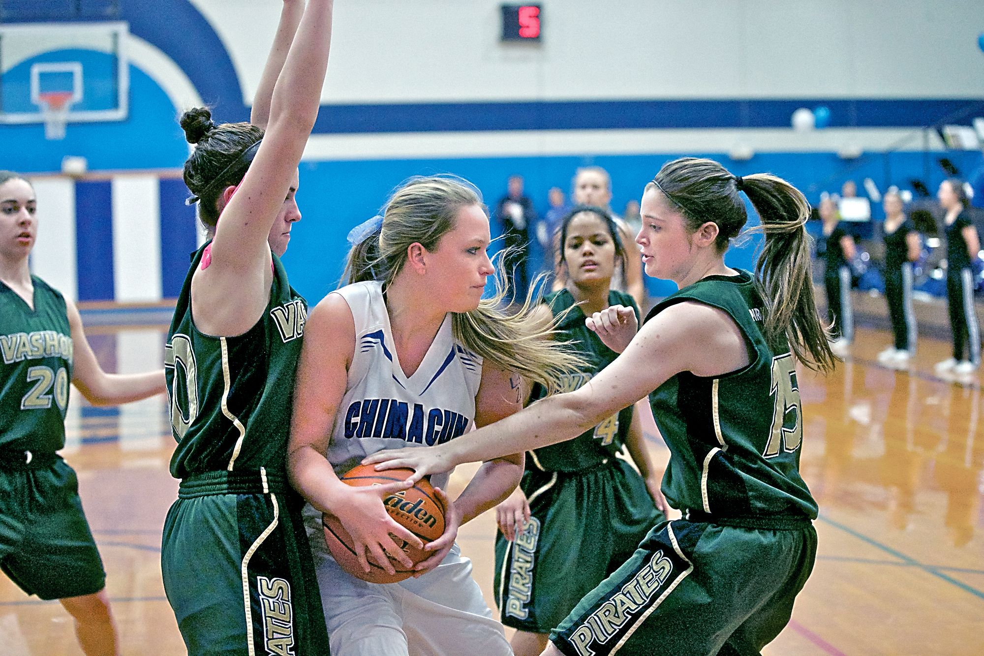 Chimacum's Lauren Thacker fights to retain possession of the ball against Vashon Island. Steve Mullensky/for Peninsula Daily News