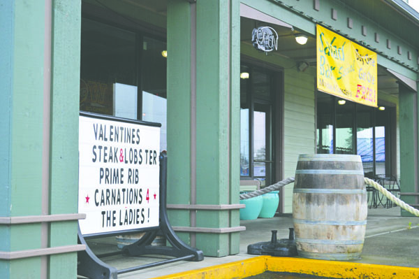 Tarcisio's owner Randy Wellman had to pay $125 for putting this sign out by the road. Joe Smillie/Peninsula Daily News