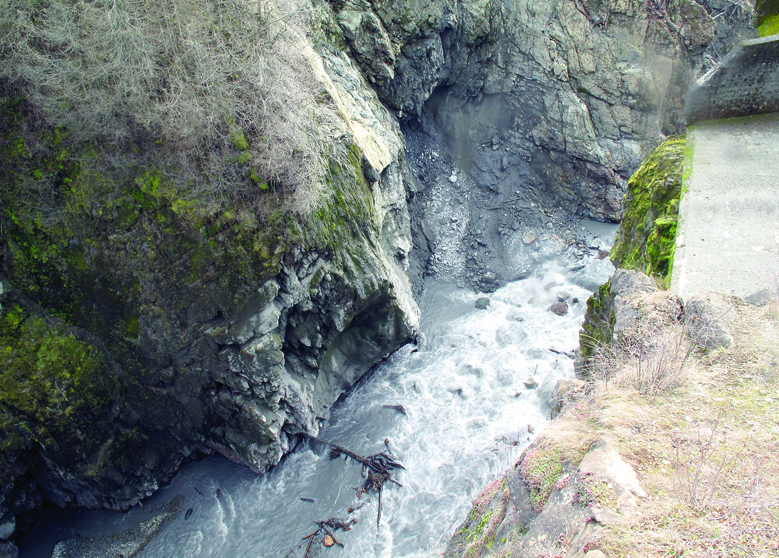 Very little of the formerly 210-foot Glines Canyon Dam remains in this Tuesday webcam photo. National Park Service