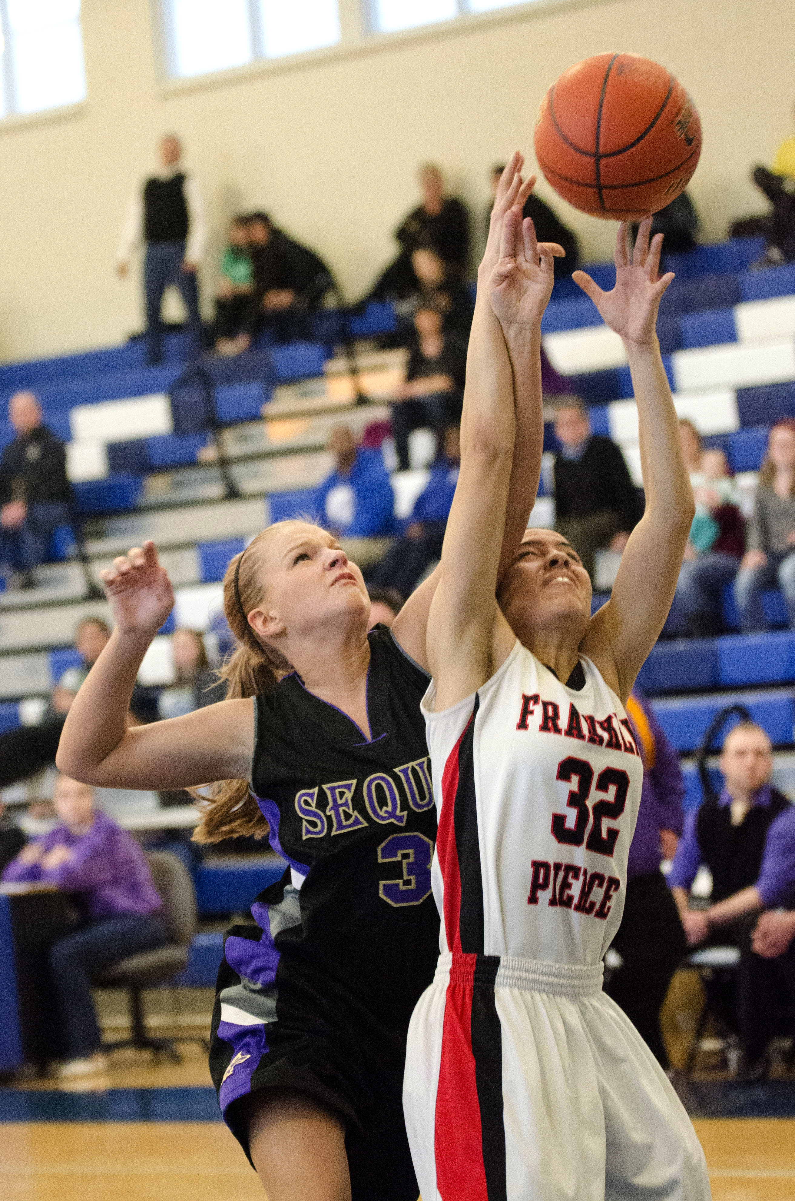 Sequim's Hailey Lester battles for a rebound with Franklin Pierce's Erica Walker at Curtis High School. Jesse Major/for Peninsula Daily News