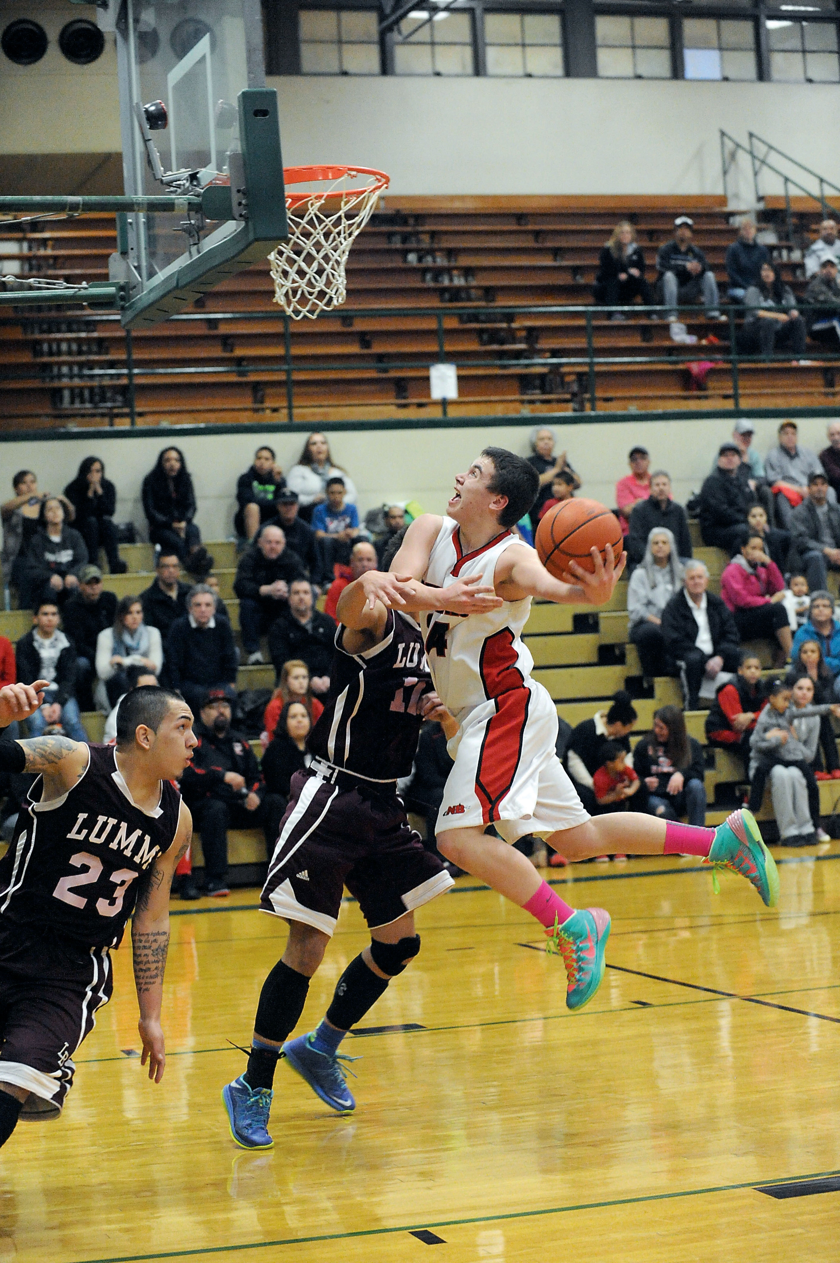 BOYS BASKETBALL Moss' 31 points lead Neah Bay over Lummi; Red Devils