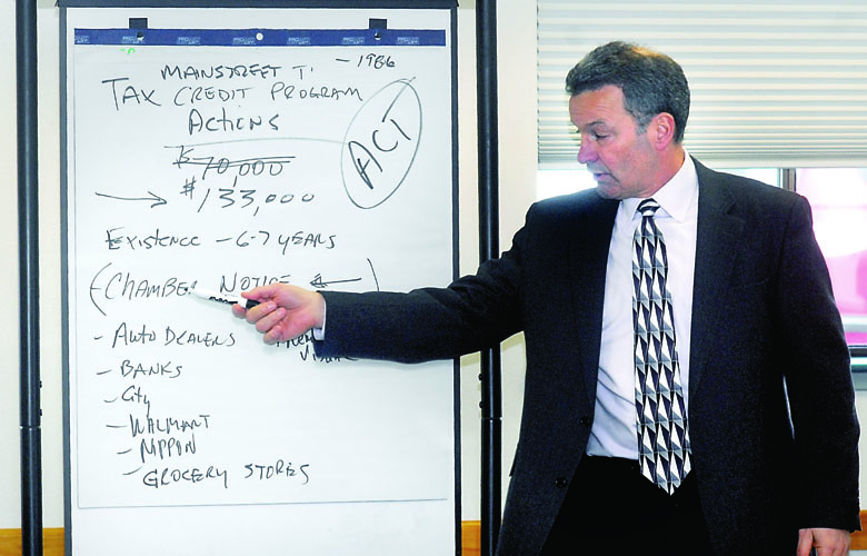 Jim Haguewood facilitates a meeting with representatives of the Port Angeles Business Association