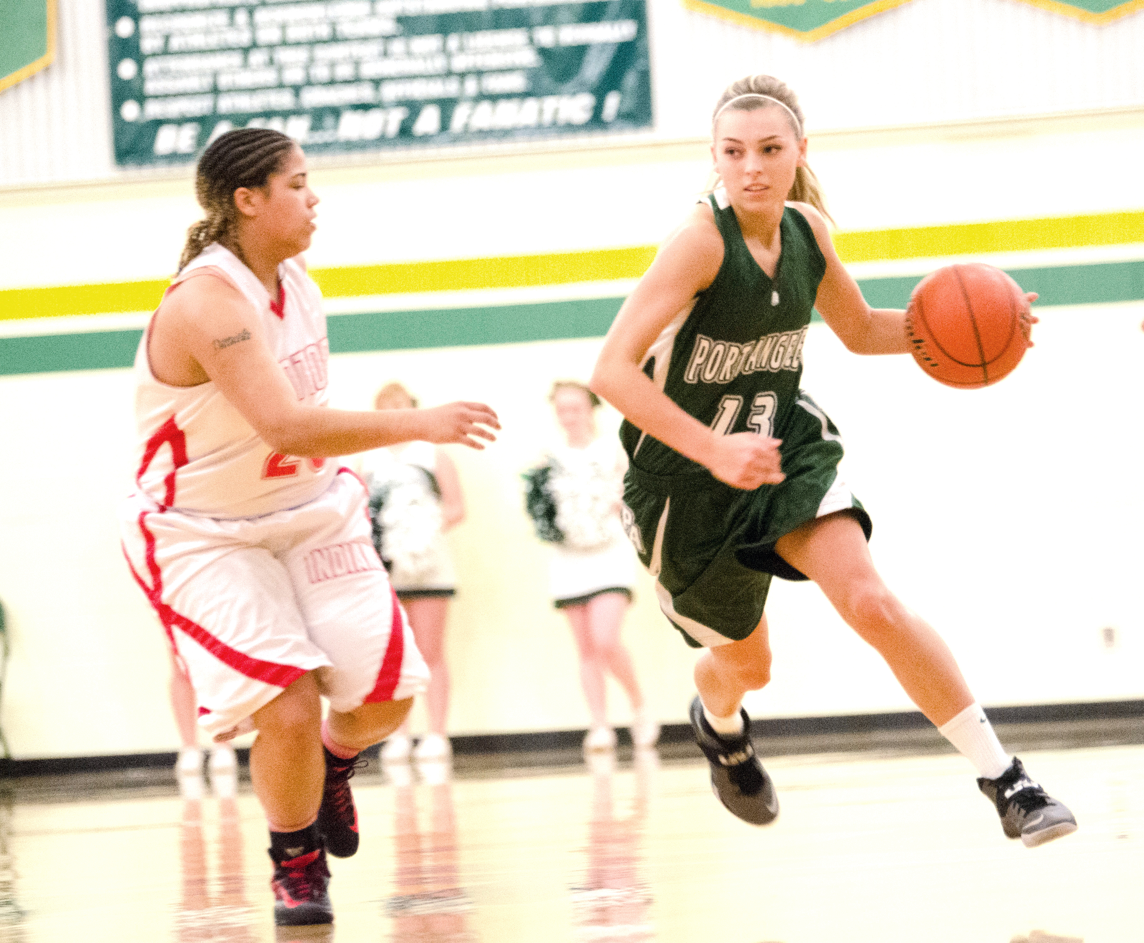 Port Angeles point guard Maddy Hinrichs advances the ball upcourt. Jesse Major/for Peninsula Daily News