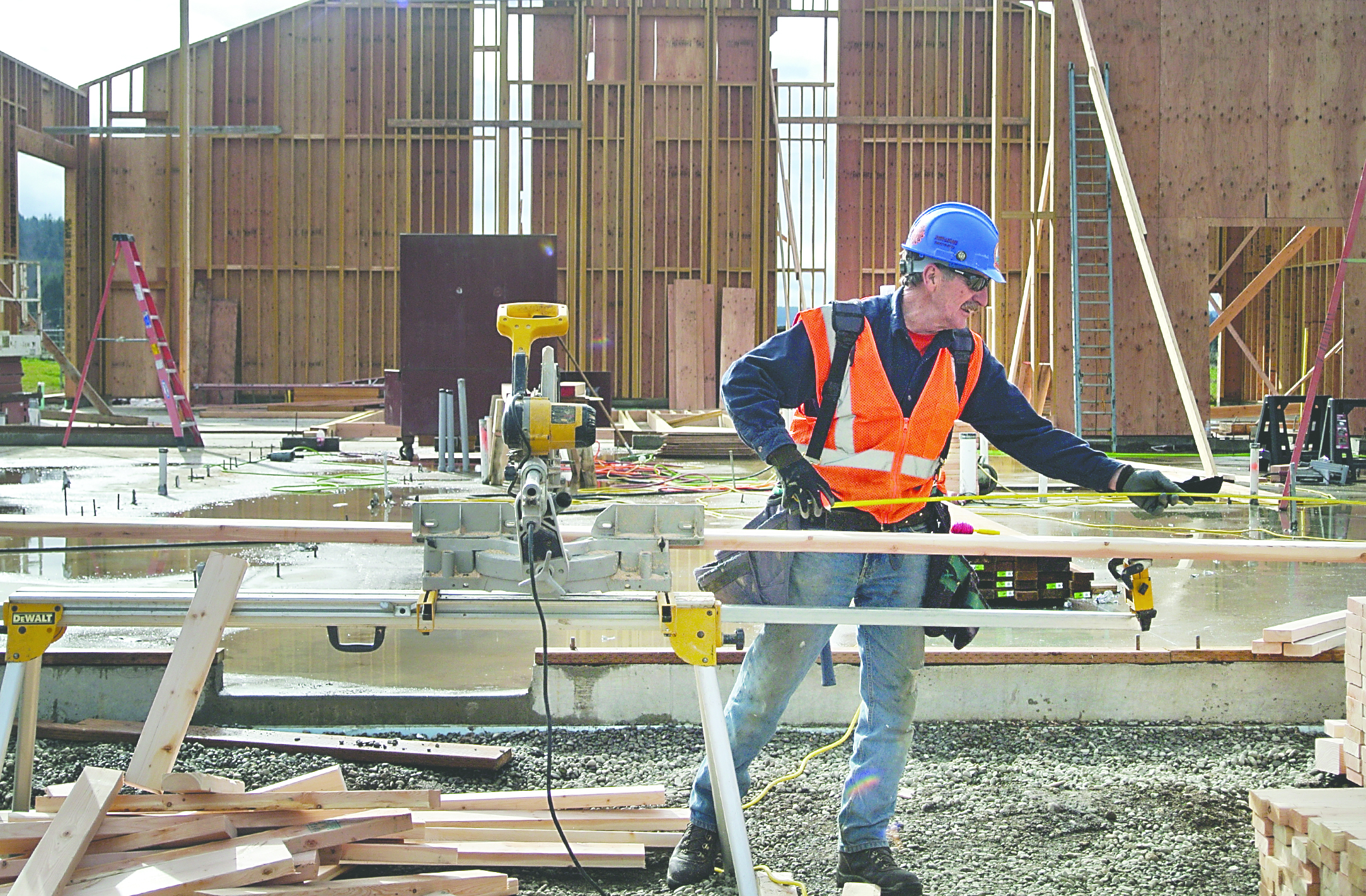 Jim Hammonds is on the construction crew building the new East Jefferson Fire-Rescue station in Chimacum. Charlie Bermant/Peninsula Daily News