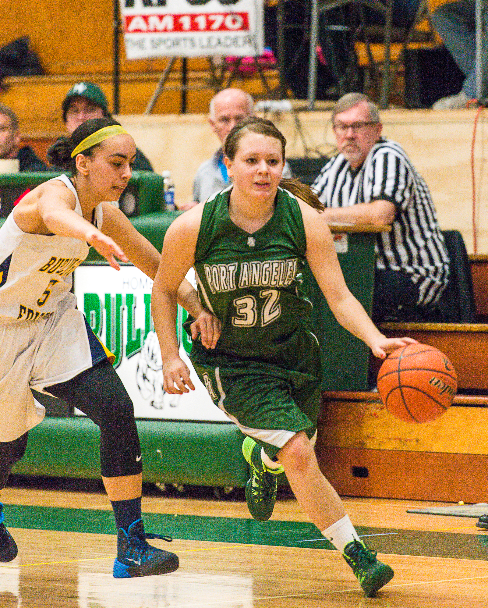 Port Angeles senior guard Krista Johnson dribbles upcourt during the Roughriders' regional win over Burlington-Edison last week. Amylynn Richards/for Peninsula Daily News