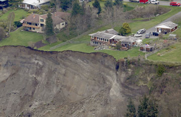 Whidbey homes damaged, road closed, ferry rocked in wild wind