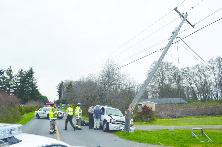 Clallam County Fire District No. 3 was dispatched at 3:43 p.m. Wednesday to Woodcock Road after a vehicle collided with a power pole. Patrick Young/Clallam County Fire District No. 3