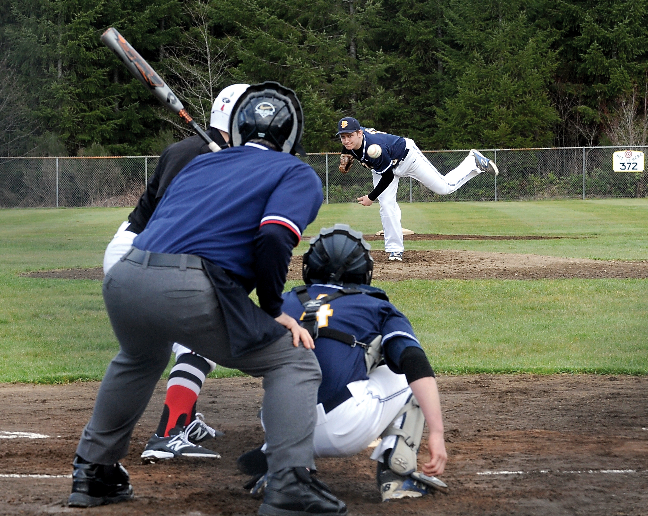 Forks pitcher Nate Gimlin delivers a strike against Tenino during the Spartans' 11-1 loss to the Beavers at Fred Orr Memorial Field in Beaver. Lonnie Archibald/for Peninsula Daily News