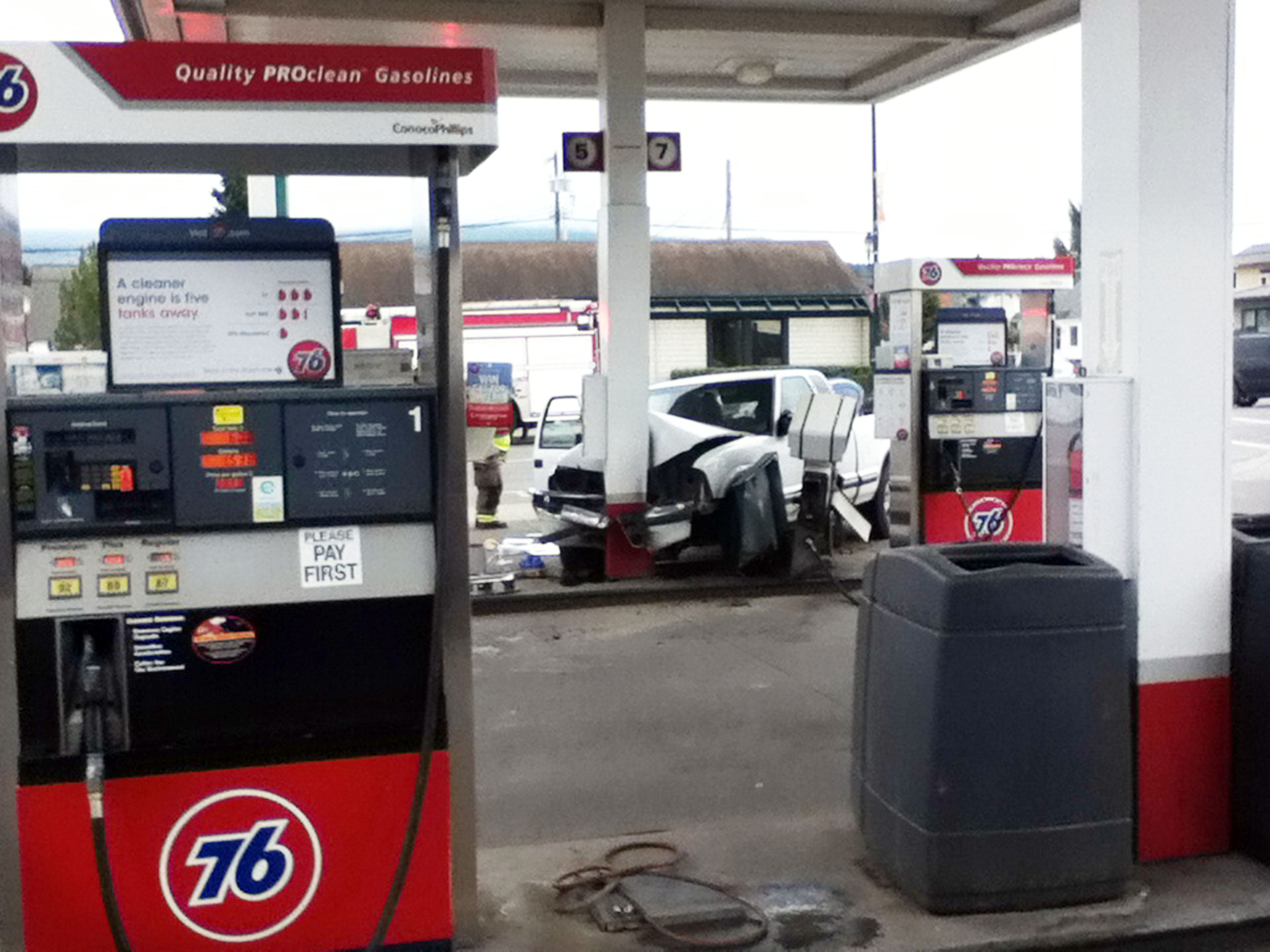 The pickup truck is shown smashed into a pole at Kettel's 76 Station in Sequim. Michael Carman/Peninsula Daily News