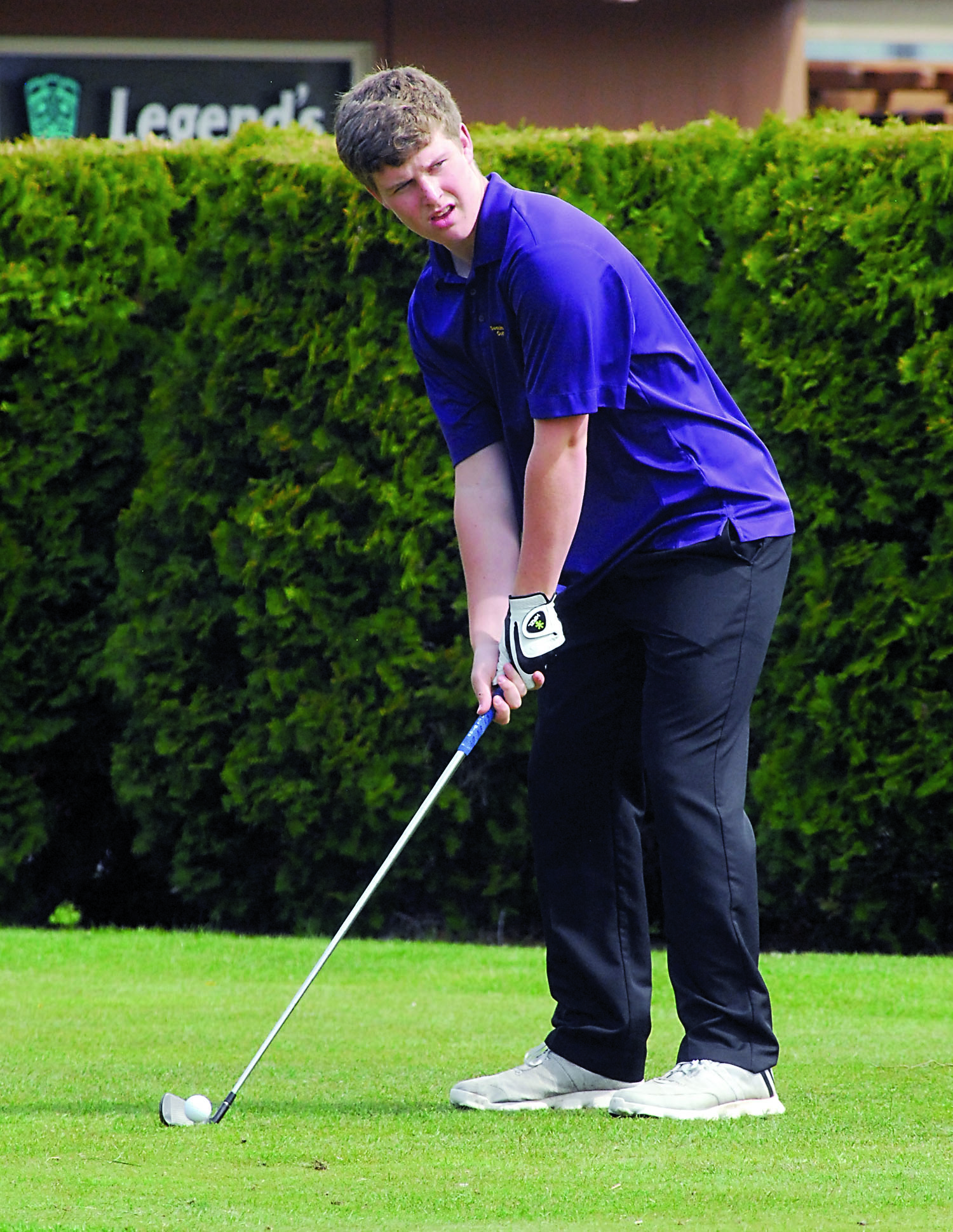 Sequim's Jack Shea eyes his target as he prepares to hit his tee shot at The Cedars at Dungeness. Keith Thorpe/Peninsula Daily News