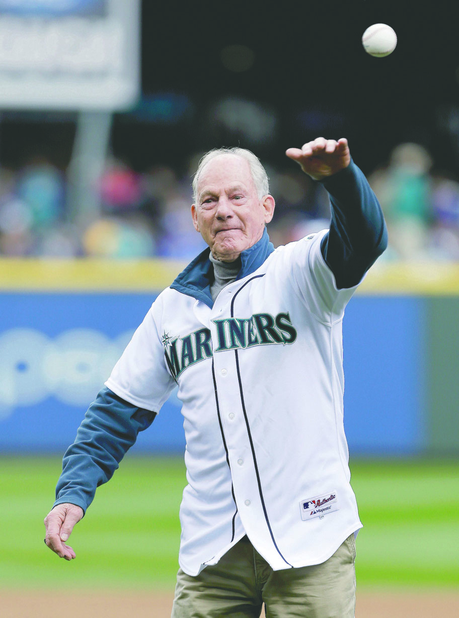 Jim Whittaker throws out the ceremonial first pitch Sunday at Safeco Field in Seattle. The Associated Press