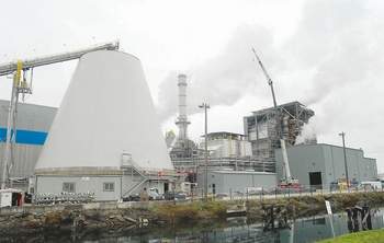 Steam billows from the Nippon Paper Industries USA mill in Port Angeles. The mill's new cogeneration plant stands in the foreground. Peninsula Daily News file photo