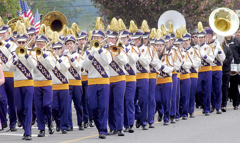 Members of the Sequim High School marching band perform as they march down Washington Street in the Grand Parade of 2013's Irrigation Festival. Keith Thorpe/Peninsula Daily News