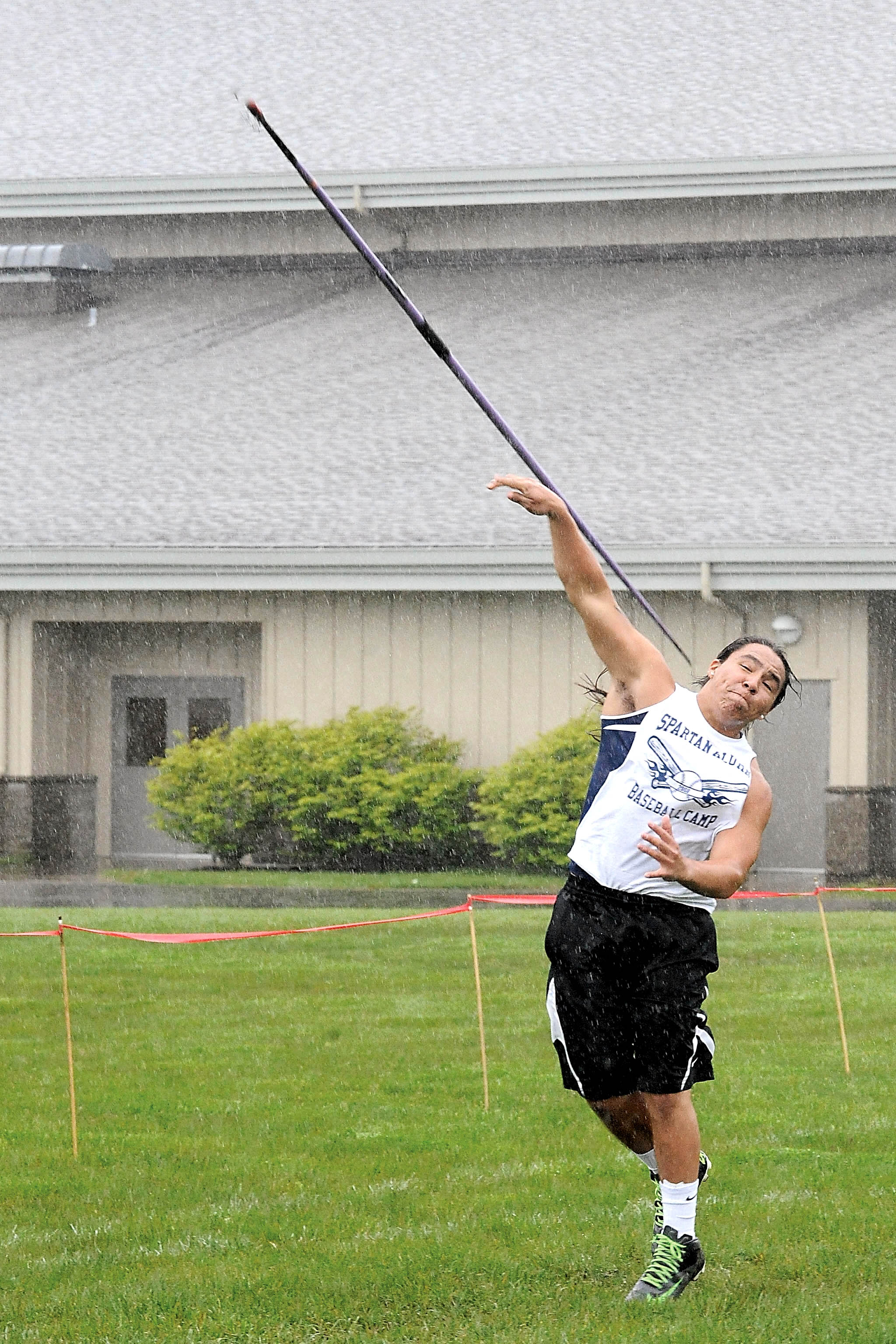 Forks' Dimitri Sampson throws the javelin at the Evergreen League meet. He finished second in the event with a throw of 121 feet and 1 inch. Lonnie Archibald/for Peninsula Daily News