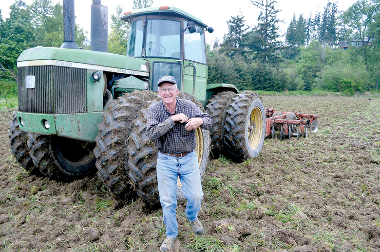 Sequim farmer Gary Smith plows a field off Lotzgesell Road on Thursday to plant corn that will require a “tremendous” amount of irrigation water to mature.” Joe Smillie/Peninsula Daily News