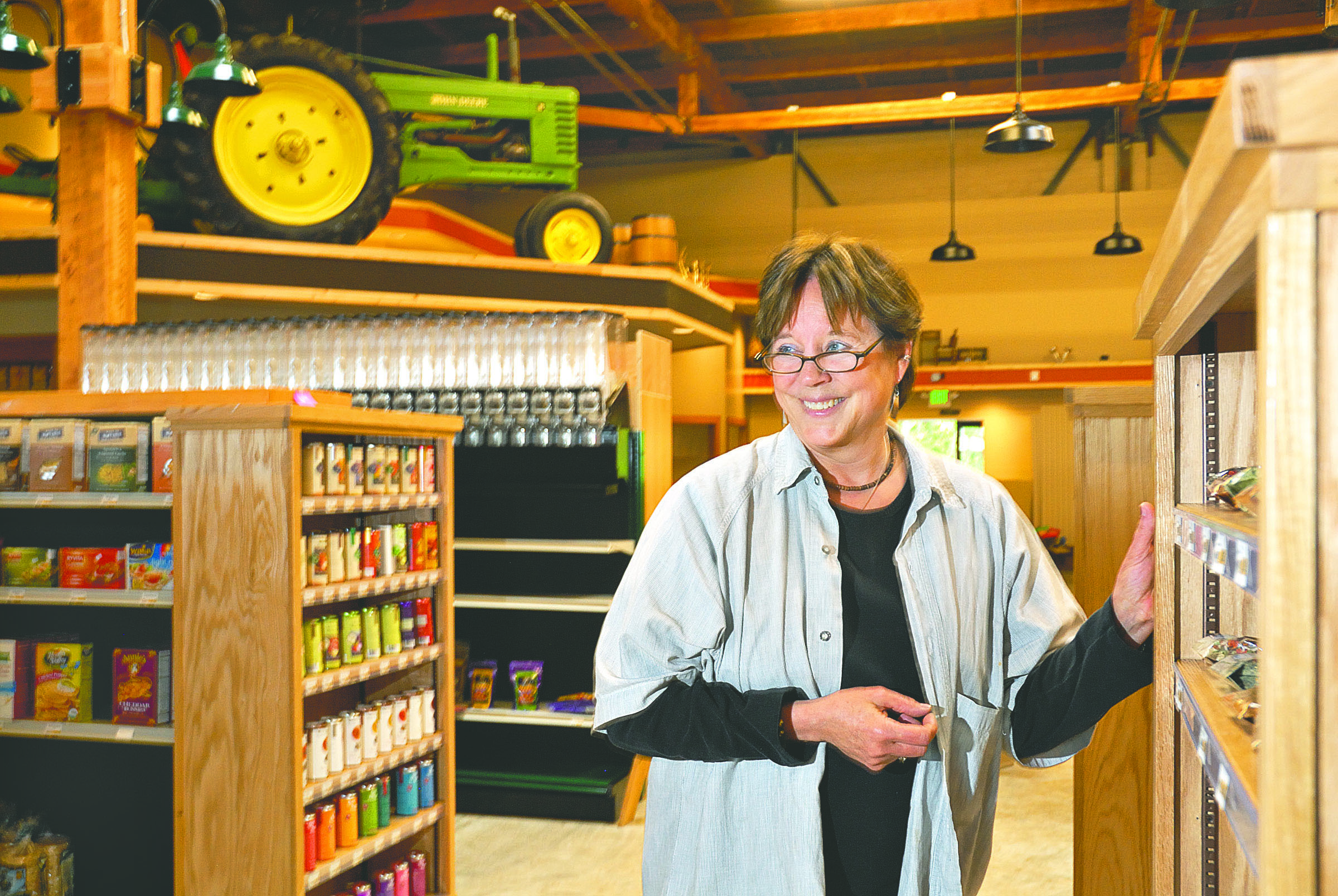 Robyn Miletich in Country Aire Natural Foods Market at the corner of Front and Oak streets in Port Angeles.  -- Peninsula Daily News photo