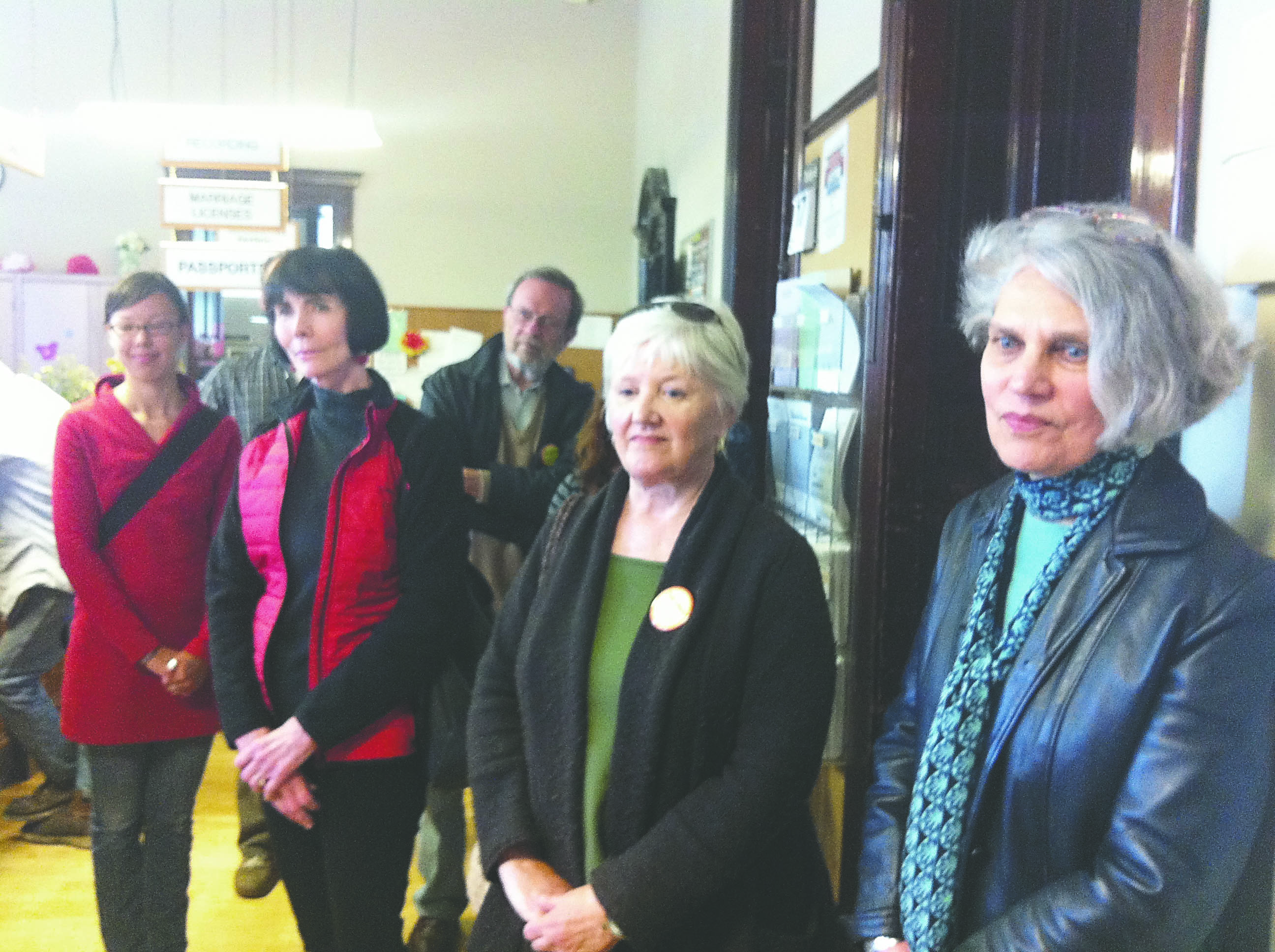 Candidates attend the ballot draw at the close of the filing period Friday. From left