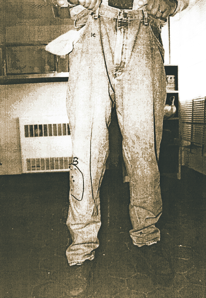 A Clallam County sheriff's deputy wears Darold Stenson's pants in April 1993. Clallam County Sheriff's Office