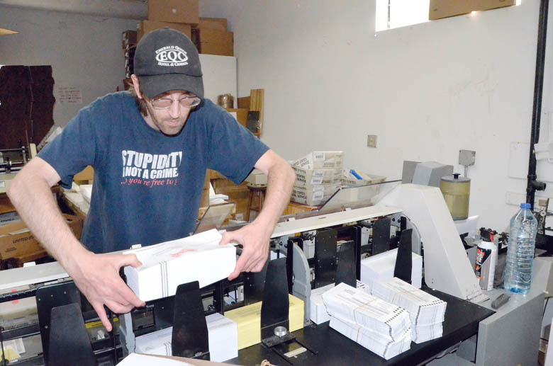 Printery of Port Townsend employee Rob Heath prepares ballots for today's mailing