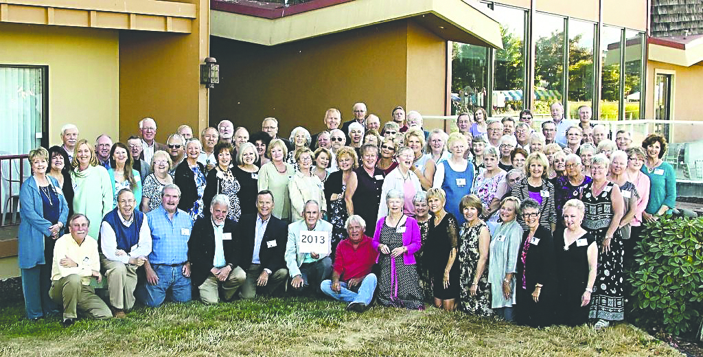 Classmates are seen at the Port Angeles High School Class of 1963's 50-year reunion dinner at the Port Angeles Red Lion Hotel.