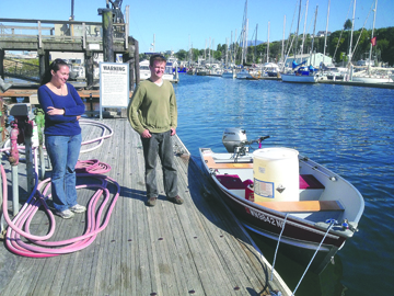 Philip Winrod stands with his friend Danel Beltran at the fuel dock at Port  Angeles Boat Haven prior to his departure for Ketchikan. Todd Ritchie