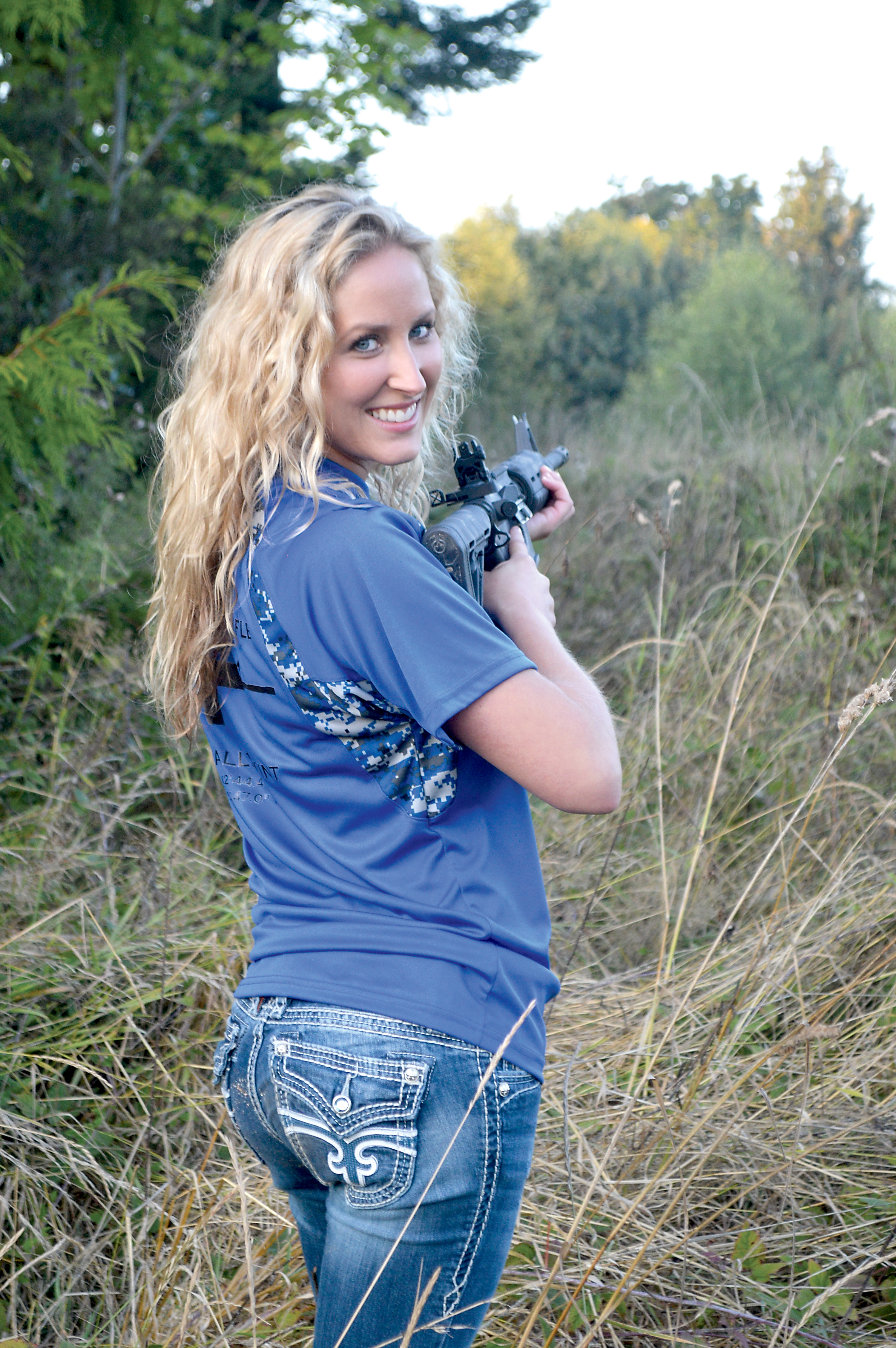 Miss Fort Discovery Stephanie Reed of Sequim after firing a practice round with the new Fort Discovery Expedition rifle made in Gardiner. Joe Smillie/Peninsula Daily News