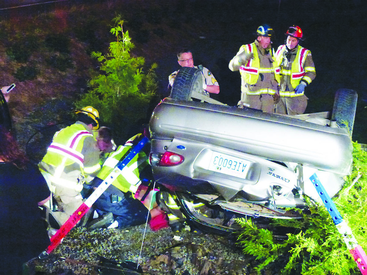 First responders arrive at the scene of a two-vehicle crash Sunday night at the intersection of Woodcock and Kitchen-Dick roads. Ed Evans/KSQM