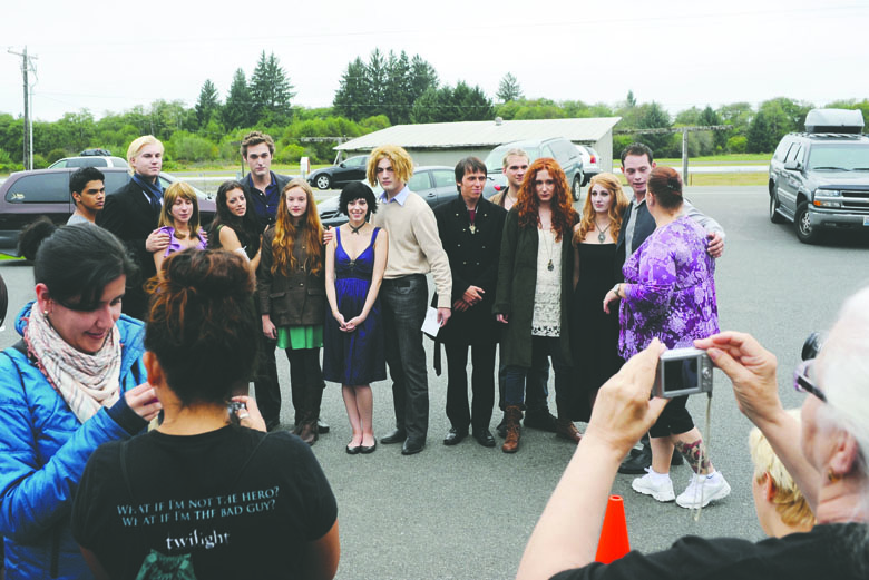 A group of Twilight character look-alikes gather in front of the Forks Visitors Center for a photograph during 2013's Stephenie Meyer Days celebration. Lonnie Archibald/for Peninsula Daily News