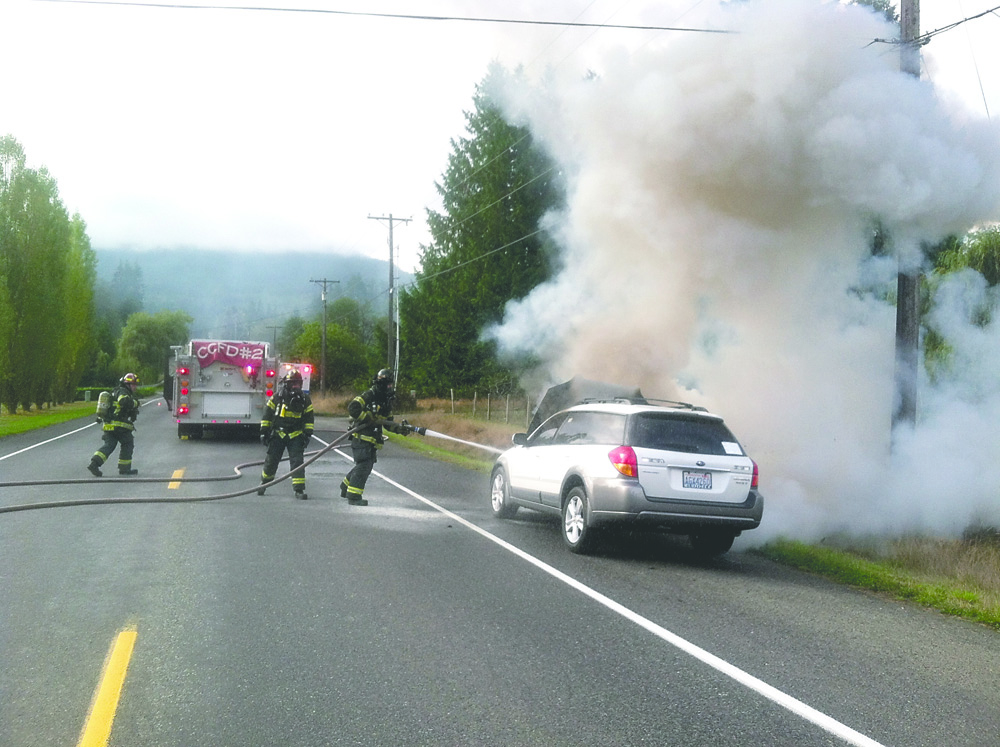 A car fire on Monroe Road east of Port Angeles blocked the road for about 45 minutes Thursday morning. Clallam County Fire District No. 2