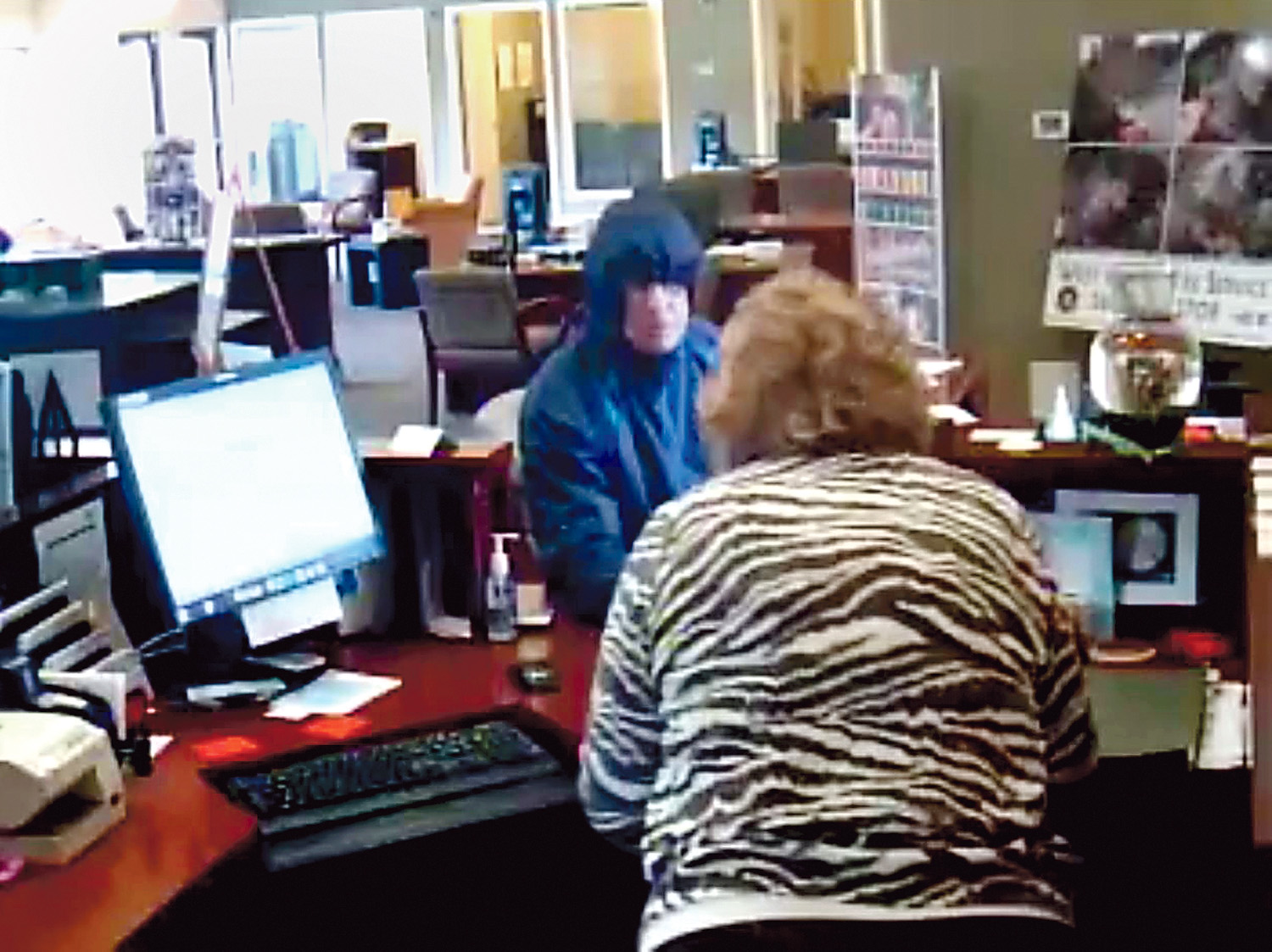 Video surveillance footage of the suspect in a bank robbery in Port Angeles. Port Angeles Police