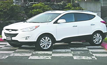 On Sunday an unidentified person entered the Ruddell Auto Mall lot in Port Angeles and stole a 2013 white Hyundai Tucson like this one.