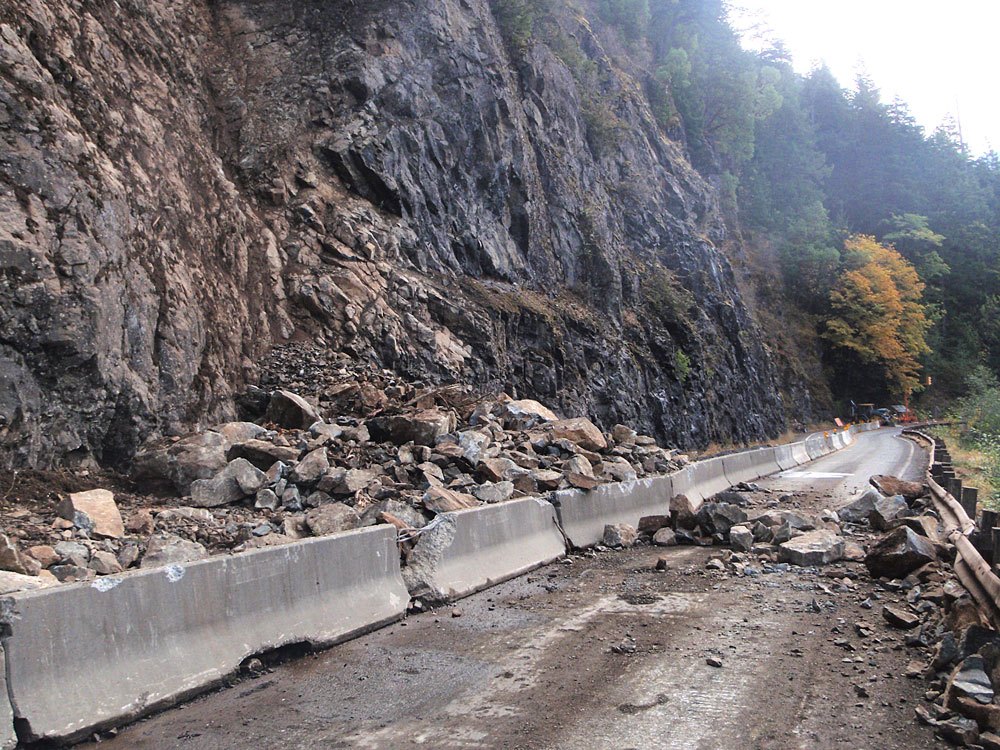 (1 of 3 photos plus map) The hillside that collapsed on U.S. Highway 101 at Milepost 228 along Lake Crescent (just before the Storm King Ranger Station at Barnes Point)